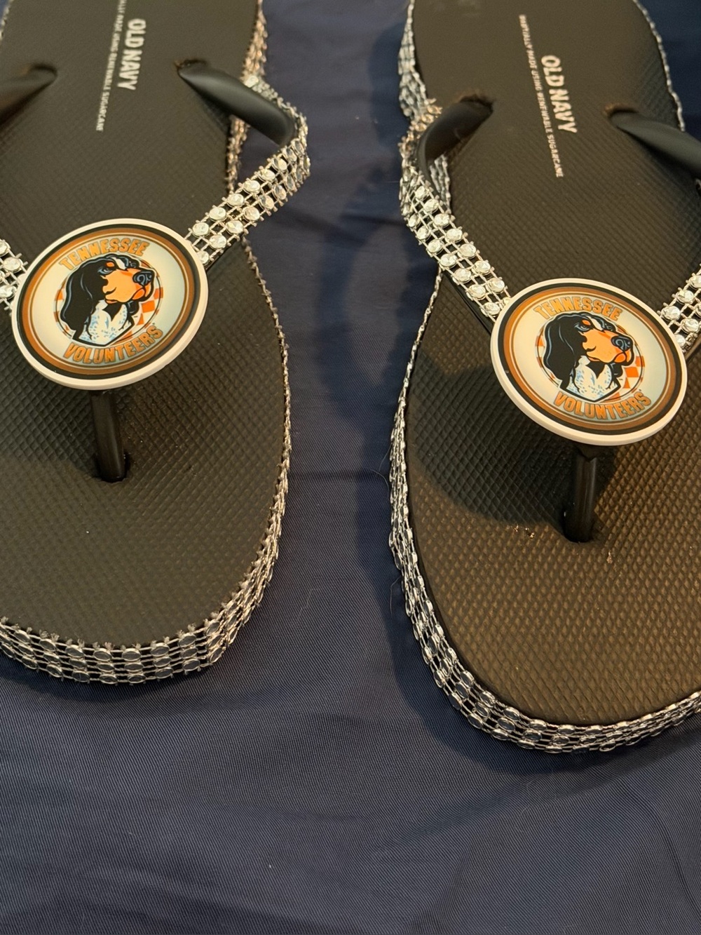 Flip-flop sandals with team emblem